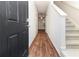 Inviting entryway featuring hardwood floors, stairs, and natural light at 915 Highwood Ln, Atlanta, GA 30344