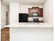 Close up of kitchen featuring modern appliances and granite counters at 915 Highwood Ln, Atlanta, GA 30344