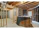 Unfinished basement with exposed beams and framing at 920 Bridge Mill Ave, Canton, GA 30114