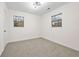 Well-lit bedroom featuring neutral walls and carpeting at 1008 King Rd, Riverdale, GA 30296