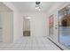 Bright dining area with tile floor and access to backyard patio at 1008 King Rd, Riverdale, GA 30296