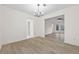 Dining room with hardwood floors and access to living room at 1008 King Rd, Riverdale, GA 30296