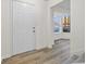 Front entry with hardwood floors and view into the living room at 1008 King Rd, Riverdale, GA 30296