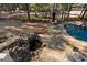 Large backyard featuring a pool with spa, waterfall feature, and lounge area at 183 Applewood Ln, Acworth, GA 30101