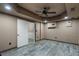 Finished basement boasts wood flooring, recessed lighting, and neutral color palette at 183 Applewood Ln, Acworth, GA 30101