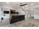 Finished basement featuring custom built-ins, a stone fireplace, and wood-look floors at 183 Applewood Ln, Acworth, GA 30101
