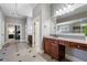 Bathroom showcasing vanity, tile flooring and access to bedroom at 183 Applewood Ln, Acworth, GA 30101