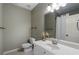 Bathroom with modern white vanity, toilet, large mirror, and shower with white curtain at 183 Applewood Ln, Acworth, GA 30101