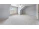 Inviting bedroom with a dormer window, ceiling fan, and plush carpeting at 183 Applewood Ln, Acworth, GA 30101