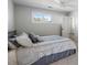 Cozy bedroom with neutral carpet, a bed with decorative pillows and lots of natural light at 183 Applewood Ln, Acworth, GA 30101