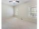 Bright bedroom with neutral walls, carpeting, and two windows allowing plenty of natural light at 183 Applewood Ln, Acworth, GA 30101