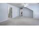 Bonus room with access to the bathroom, stairs, and storage creating a dynamic living space at 183 Applewood Ln, Acworth, GA 30101