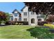 Beautiful home with a well-manicured lawn and a combination of painted and brick facade at 183 Applewood Ln, Acworth, GA 30101