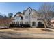 Charming two-story home featuring a manicured lawn and neutral painted brick exterior at 183 Applewood Ln, Acworth, GA 30101