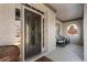 Charming front porch with rocking chairs, white brick, and decorative glass front door at 183 Applewood Ln, Acworth, GA 30101