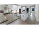 Open kitchen featuring granite countertops, stainless appliances, and island at 183 Applewood Ln, Acworth, GA 30101