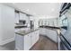 Updated kitchen with granite countertops, stainless appliances and center island at 183 Applewood Ln, Acworth, GA 30101