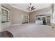 Expansive living room with open floor plan and view of modern kitchen at 183 Applewood Ln, Acworth, GA 30101