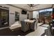 Beautiful covered deck with ceiling fan, table and chairs, and outdoor television at 183 Applewood Ln, Acworth, GA 30101