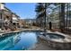 Backyard view featuring a pool, hot tub, and patio at 183 Applewood Ln, Acworth, GA 30101