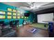 Recreation room featuring golf simulator, sitting area and barstool seating at 183 Applewood Ln, Acworth, GA 30101
