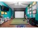 Recreation room with simulator, framed pictures and seating area at 183 Applewood Ln, Acworth, GA 30101