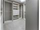 A well-organized walk-in closet featuring custom shelves and drawers, maximizing storage and space at 183 Applewood Ln, Acworth, GA 30101
