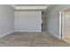 Spacious carpeted bedroom with recessed lighting, a tray ceiling, and a doorway to an adjacent room at 3353 Pearl Ridge Way, Buford, GA 30519