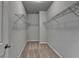 Walk-in closet with neutral carpeting and wire shelving for maximum storage at 3353 Pearl Ridge Way, Buford, GA 30519