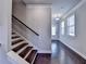 Entryway featuring wood flooring and stairs, light walls, and natural light at 3353 Pearl Ridge Way, Buford, GA 30519
