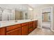 Bathroom with double vanity and access to bedroom at 262 Senna St, Marietta, GA 30064