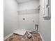 Convenient laundry room with shelving and flooring at 262 Senna St, Marietta, GA 30064