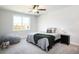 Spacious bedroom with large bed and window at 768 Marlay Ln, Powder Springs, GA 30127