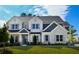 Two-story home with light gray brick and dark gray siding at 768 Marlay Ln, Powder Springs, GA 30127