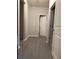 Bright hallway with access to bedrooms and bathroom at 15 Manas Ct, Covington, GA 30016