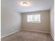 Bright bedroom with neutral walls and carpet at 530 Balfour Dr, Decatur, GA 30032