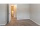 Simple bedroom with neutral walls and carpet at 530 Balfour Dr, Decatur, GA 30032