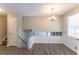 Charming dining room with chandelier and hardwood floors at 530 Balfour Dr, Decatur, GA 30032