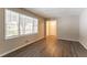 Bright living room featuring hardwood floors and large windows at 530 Balfour Dr, Decatur, GA 30032