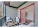 Balcony features seating, a table, and a view to yard at 3204 Woodrow Ne Way, Atlanta, GA 30319