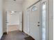 Entryway features decorative glass in the door and sidelight, and a tile floor at 3204 Woodrow Ne Way, Atlanta, GA 30319