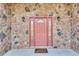 Charming home's front door is framed by a stone facade and decorative sconces at 3204 Woodrow Ne Way, Atlanta, GA 30319