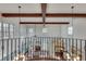 Balcony view of living room and kitchen with hardwood floors and tall ceilings at 3204 Woodrow Ne Way, Atlanta, GA 30319