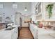 Bright kitchen with hardwood flooring, light countertops, stainless steel appliances, and decorative tile backsplash at 3204 Woodrow Ne Way, Atlanta, GA 30319
