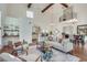 Inviting living room features high ceilings, hardwood floors, and an open connection to the kitchen at 3204 Woodrow Ne Way, Atlanta, GA 30319