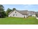 New construction home with attached garage and spacious yard in a tranquil neighborhood at 3709 Tielman St, Snellville, GA 30078
