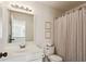 Clean bathroom with a white vanity and shower/tub combo at 64 Whitlock Sq, Marietta, GA 30064