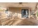 Wooden back porch with ceiling fan and access to backyard at 1489 New Hope Rd, Locust Grove, GA 30248