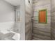 Updated bathroom with a walk-in shower and bathtub at 1489 New Hope Rd, Locust Grove, GA 30248