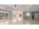 Open dining room with tile floors and access to deck at 1489 New Hope Rd, Locust Grove, GA 30248
